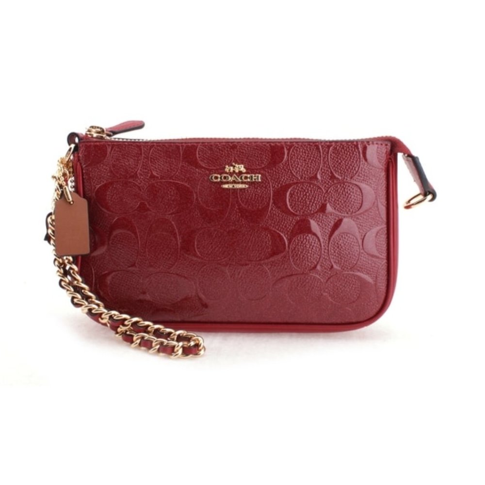 Coach signature debossed patent leather wristlet
